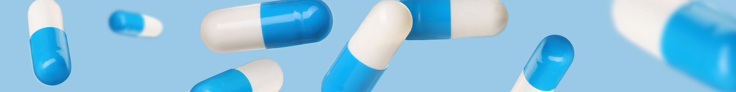 lp-banner-blue-white-capsules-falling.jpg