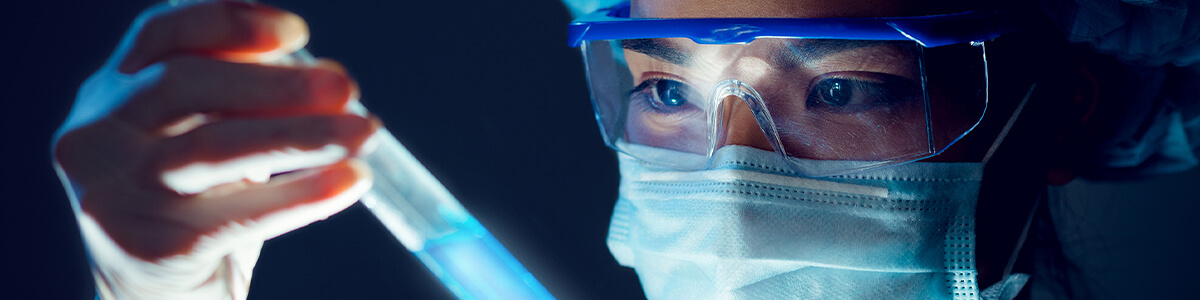 Scientist with test tube